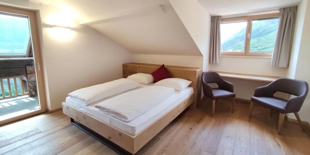 Mittelbergerhof Ferienwohnungen Vilpiano Bagian luar foto