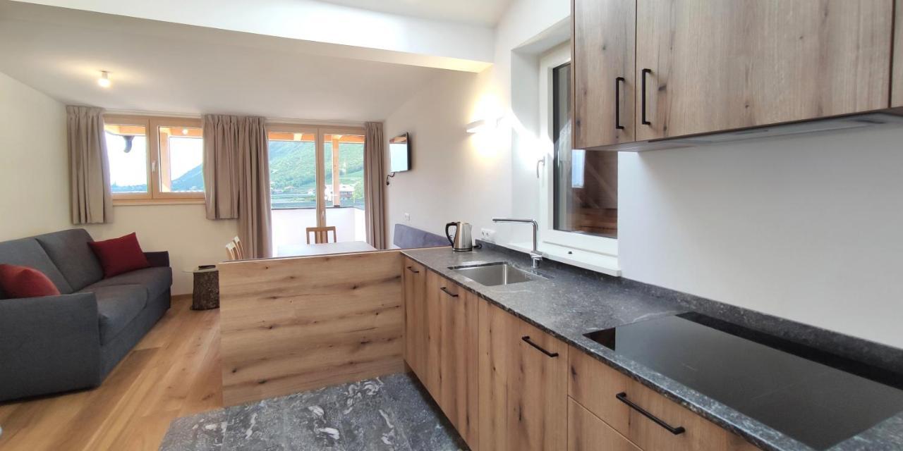 Mittelbergerhof Ferienwohnungen Vilpiano Bagian luar foto